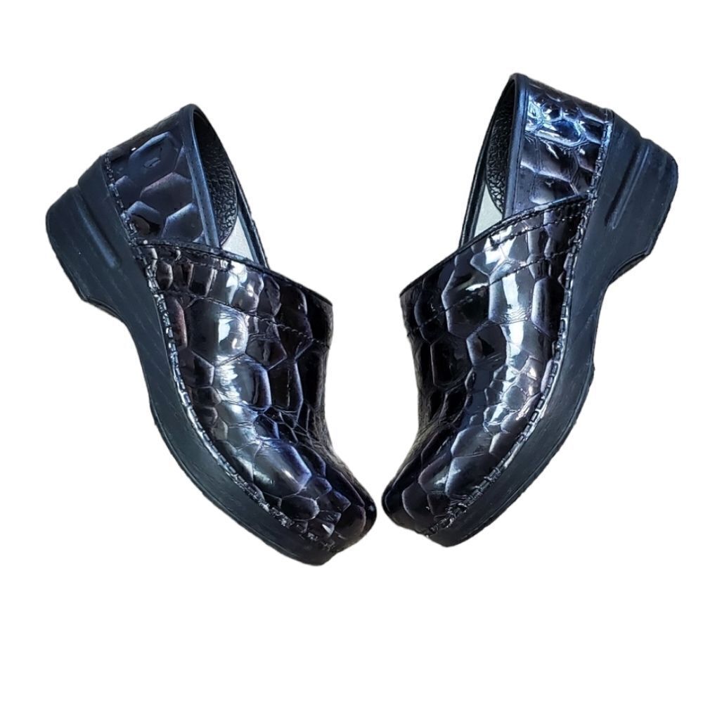 Dansko Black Animal Print Leather Clogs